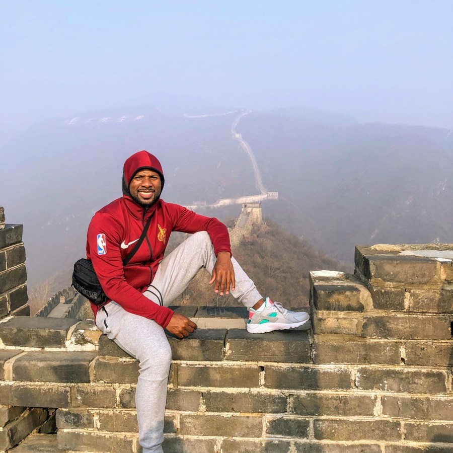Posing for a picture on the Great Wall of China